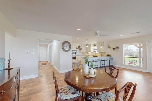1905 Brushy Bend Dr, Round Rock, TX 78681 - dining room featuring light wood finished floors, recessed lighting, baseboards, and a ceiling fan