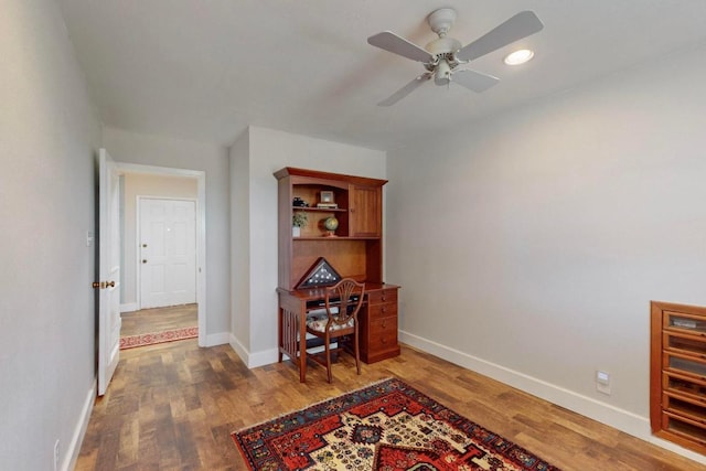 home office featuring recessed lighting, wood finished floors, baseboards, and ceiling fan