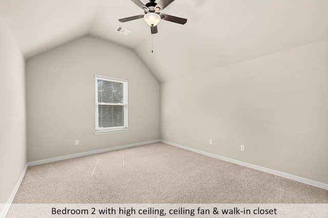 bonus room featuring carpet, visible vents, vaulted ceiling, ceiling fan, and baseboards