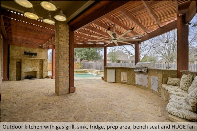 view of patio with a fenced in pool, a grill, a pergola, exterior kitchen, and a fenced backyard