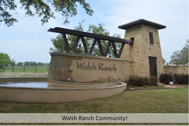 community sign with fence