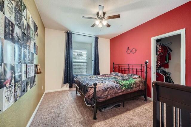 165 Crescent Heights Dr, Georgetown, TX 78628 - bedroom with carpet, baseboards, and a ceiling fan