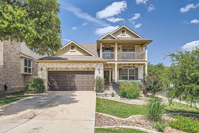 165 Crescent Heights Dr, Georgetown, TX 78628 - view of front of house featuring stone siding, an attached garage, covered porch, concrete driveway, and a balcony