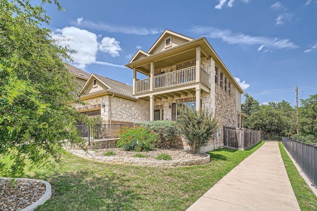 165 Crescent Heights Dr, Georgetown, TX 78628 - view of side of property featuring a balcony and stone siding