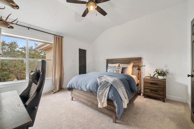 bedroom with ceiling fan, baseboards, carpet, and lofted ceiling