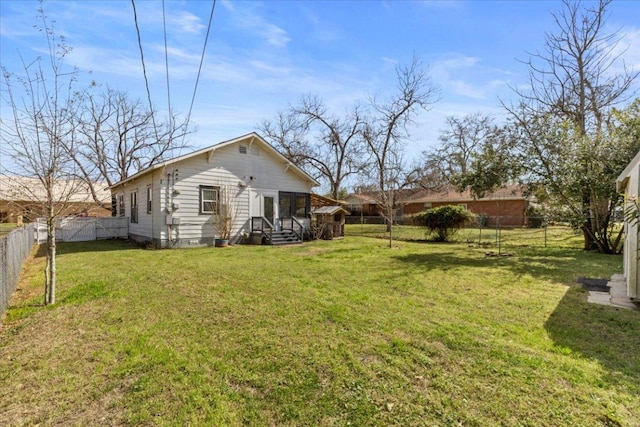 view of yard with a fenced backyard