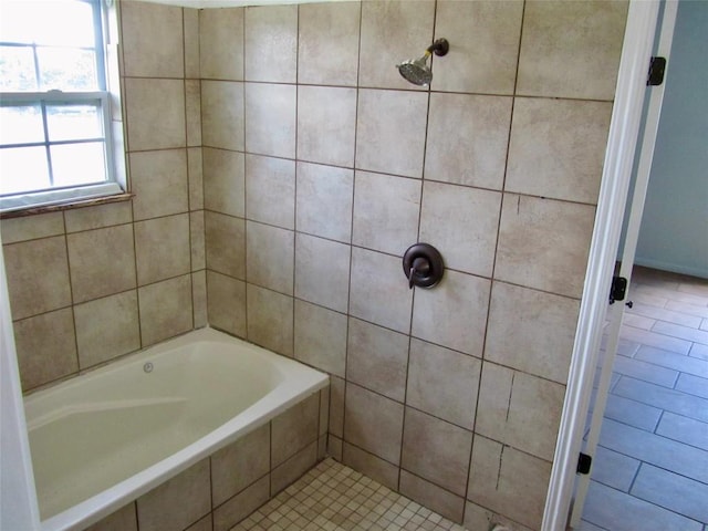 full bath with tiled shower and tiled tub