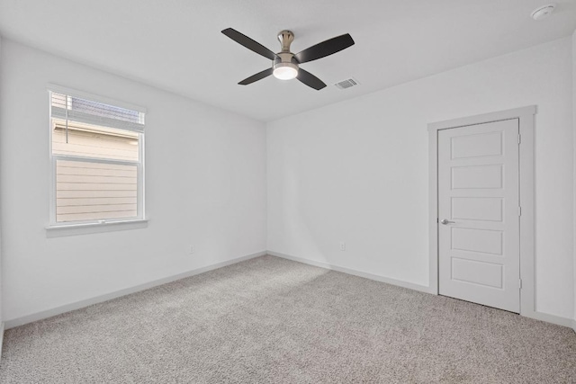 10410 Fulton Ave, Austin, TX 78754 - carpeted empty room featuring a ceiling fan, baseboards, and a smoke detector