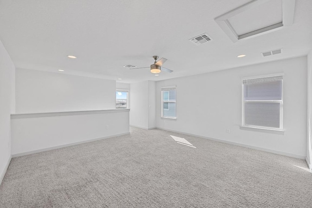 10410 Fulton Ave, Austin, TX 78754 - carpeted spare room with recessed lighting, baseboards, and attic access