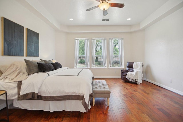 212 Venture Blvd S, Point Venture, TX 78645 - bedroom with wood finished floors, ceiling fan, and recessed lighting