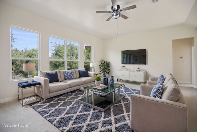 212 Venture Blvd S, Leander, TX 78645 - living area featuring baseboards, healthy amount of natural light, and a ceiling fan