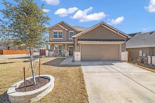 craftsman-style home with driveway, an attached garage, fence, and stucco siding