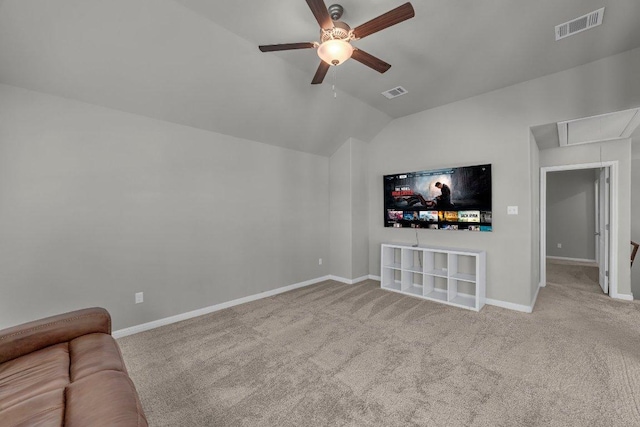 unfurnished living room with attic access, visible vents, vaulted ceiling, and baseboards