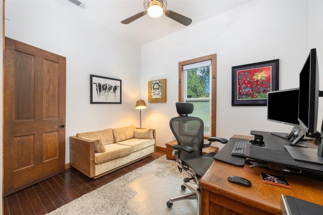 office with dark wood-style floors and ceiling fan