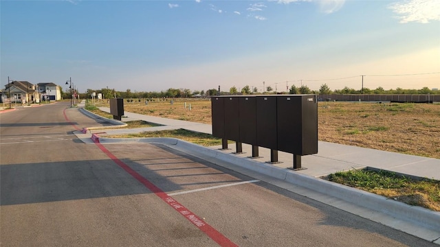 view of road featuring curbs and sidewalks