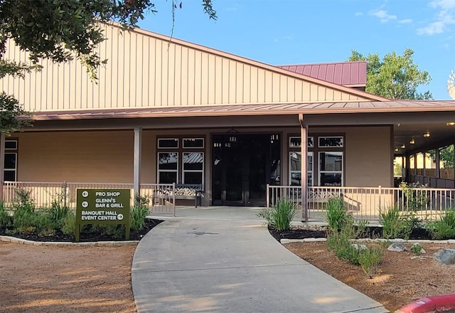 view of building exterior featuring fence