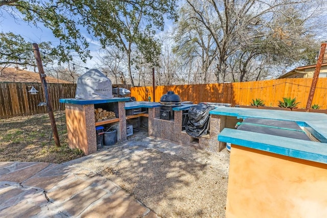 view of patio with a fenced backyard