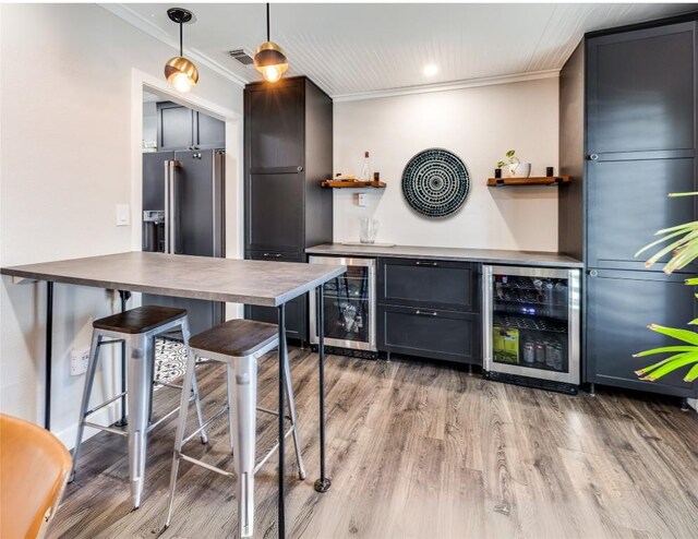 kitchen with beverage cooler, fridge, and open shelves