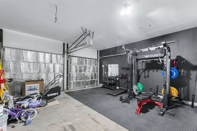 exercise area featuring a garage