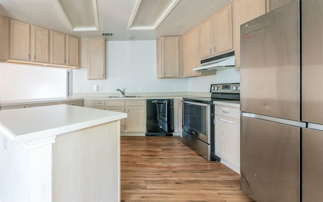 kitchen with visible vents, appliances with stainless steel finishes, light brown cabinets, a sink, and under cabinet range hood