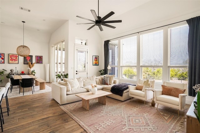 296 Running Bird Rd, Austin, TX 78737 - living area featuring wood finished floors, visible vents, high vaulted ceiling, and a ceiling fan
