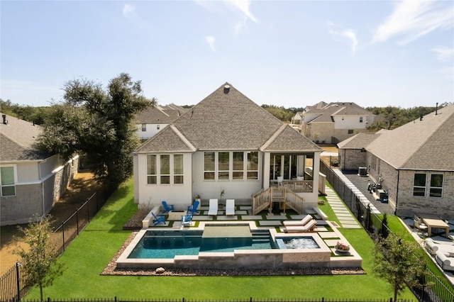 296 Running Bird Rd, Austin, TX 78737 - rear view of property with a fenced in pool, an outdoor living space with a fire pit, a fenced backyard, a lawn, and stucco siding