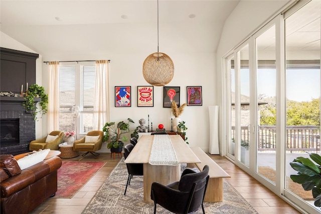 296 Running Bird Rd, Austin, TX 78737 - interior space with lofted ceiling, wood finished floors, and a fireplace
