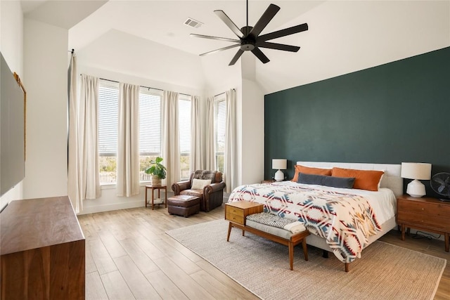 296 Running Bird Rd, Austin, TX 78737 - bedroom with wood finished floors, vaulted ceiling, and ceiling fan