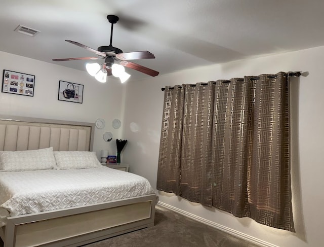 bedroom with a ceiling fan, visible vents, and carpet flooring