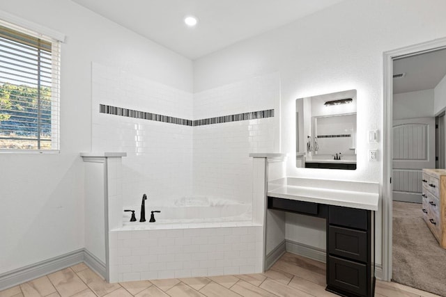 2807 Grimes Crossing Rd, Copperas Cove, TX 76522 - bathroom with vanity, a bath, baseboards, and recessed lighting