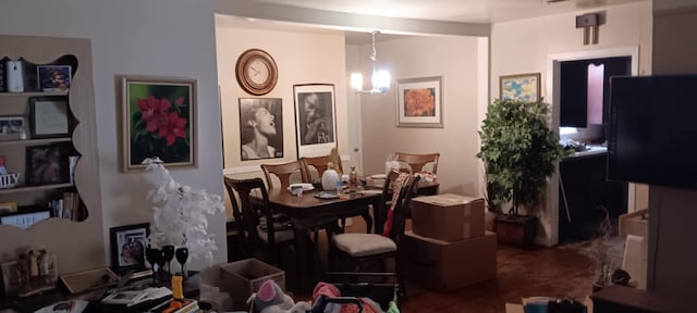 dining area with a notable chandelier