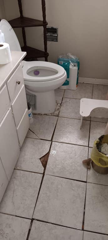 bathroom featuring vanity, toilet, and tile patterned floors