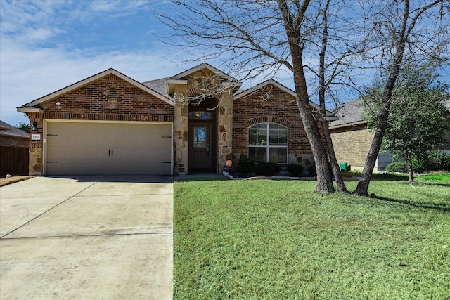 view of front facade featuring an attached garage, brick siding, driveway, stone siding, and a front yard