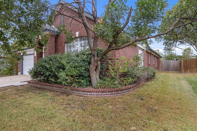 13106 Bennington Ln, Austin, TX 78753 - view of property exterior featuring brick siding