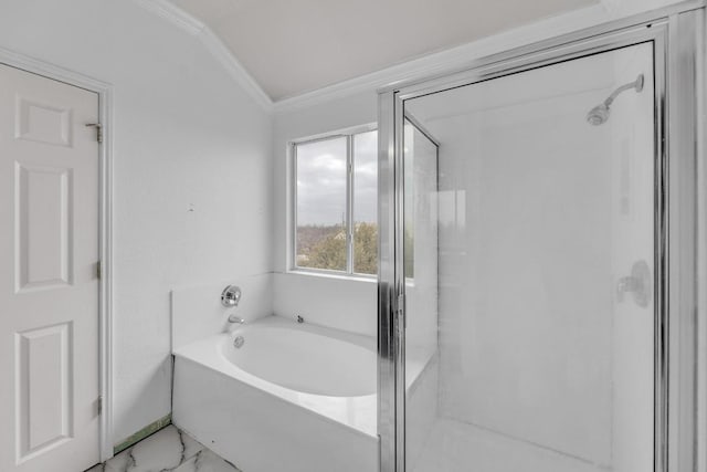 15009 Mossycup Ln, Austin, TX 78724 - bathroom featuring crown molding, a bath, a shower stall, marble look tiles, and vaulted ceiling