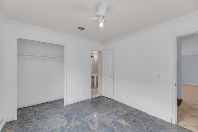15009 Mossycup Ln, Austin, TX 78724 - unfurnished bedroom featuring ornamental molding, a closet, a ceiling fan, and baseboards
