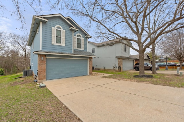 view of front of home featuring concrete driveway, brick siding, an attached garage, and cooling unit