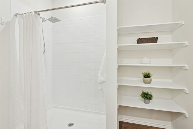 187 Dorchester Dr, Kyle, TX 78640 - bathroom with a tile shower