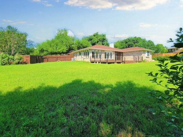 2605 Hilltop St, Round Rock, TX 78681 - view of yard featuring a wooden deck