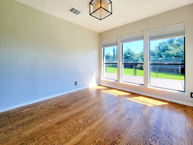 2605 Hilltop St, Round Rock, TX 78681 - unfurnished room featuring wood finished floors and baseboards