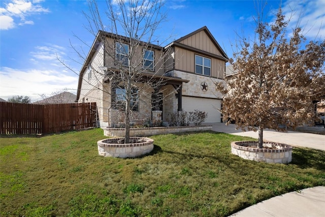 view of front of property featuring an attached garage, fence, stone siding, driveway, and a front lawn