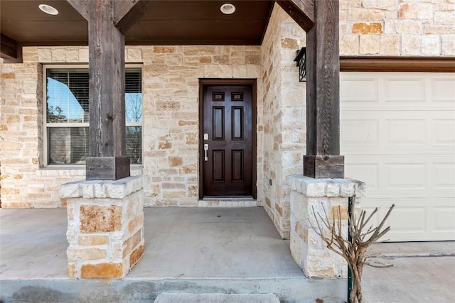 entrance to property with stone siding