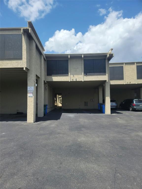 exterior space featuring stucco siding