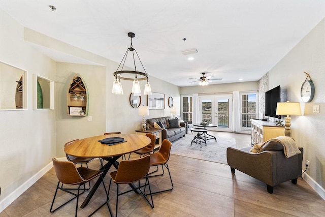 3404 American Dr Unit 3221, Lago Vista, TX 78645 - dining room featuring baseboards, light wood-style floors, and ceiling fan