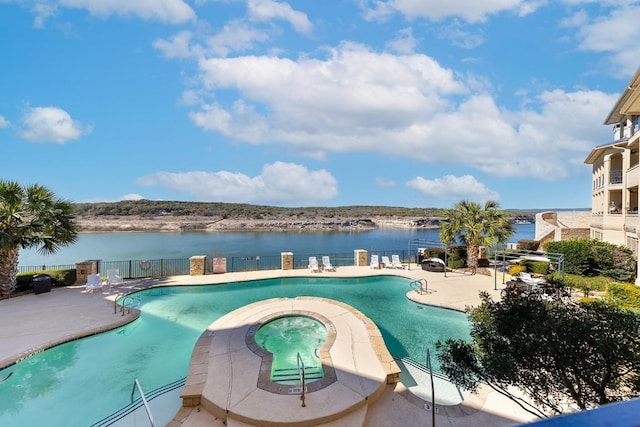 3404 American Dr Unit 3221, Lago Vista, TX 78645 - community pool with a water view, a patio area, and a hot tub