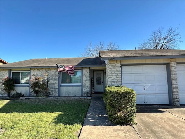 view of front facade featuring a front lawn, stone siding, an attached garage, and concrete driveway