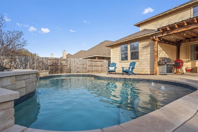 view of swimming pool featuring fence, grilling area, a fenced in pool, and a patio