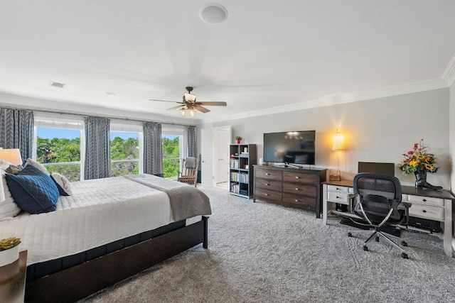 carpeted bedroom with multiple windows, visible vents, and ornamental molding