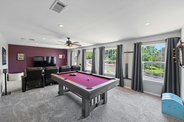 game room featuring a textured ceiling, carpet flooring, billiards, visible vents, and baseboards