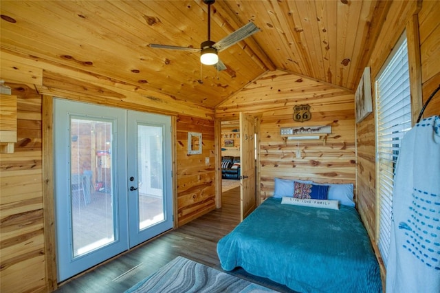 bedroom featuring wood walls, wood finished floors, wood ceiling, access to exterior, and french doors